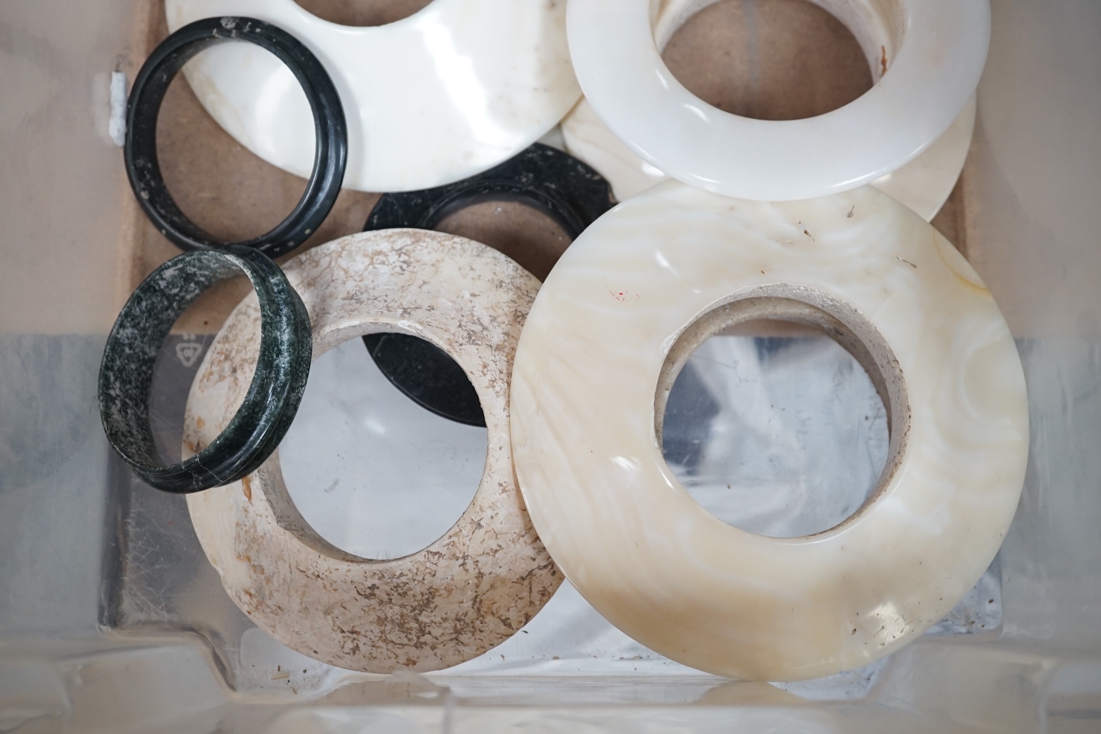 A group of tribal stone bangles or arm bands